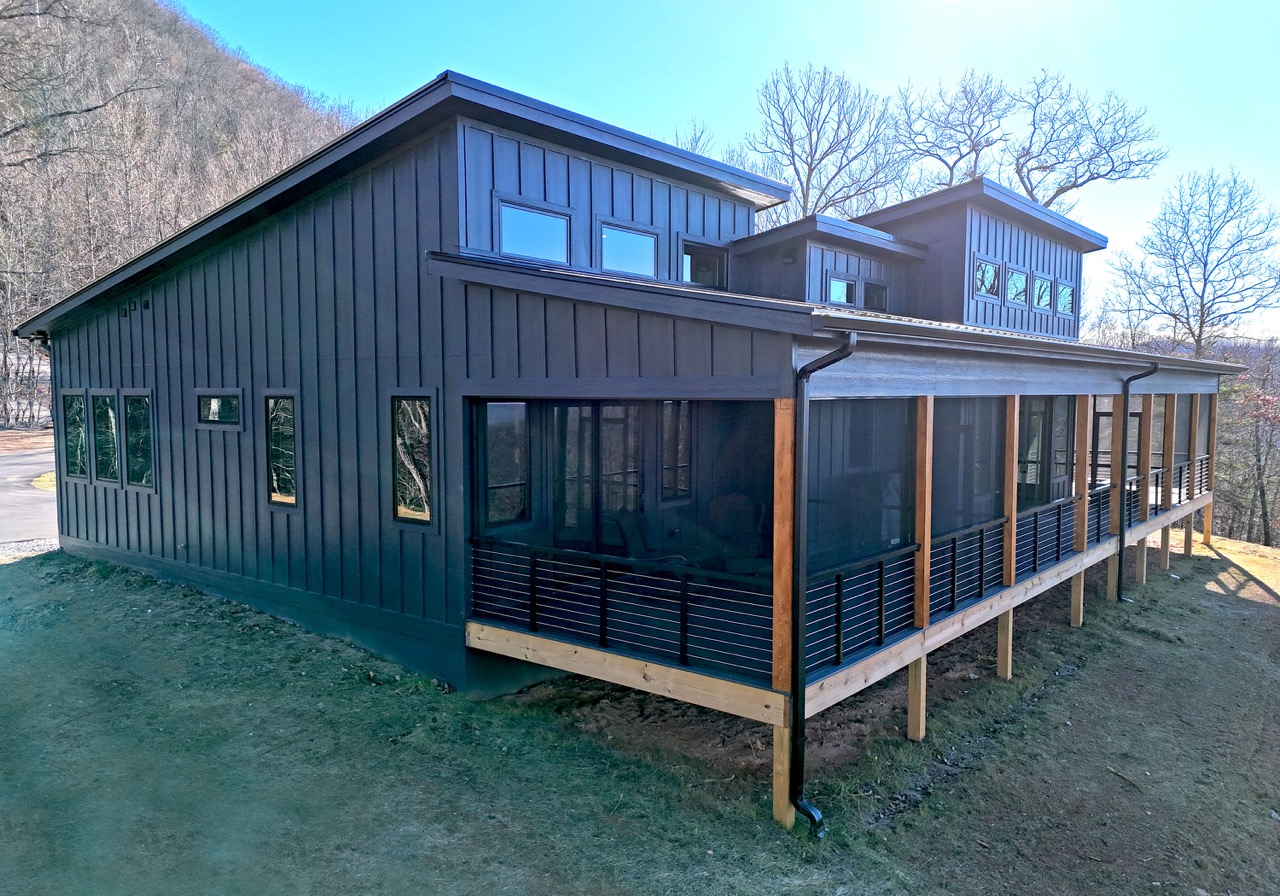 black custom home with large patio 2